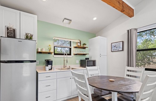 Fredericksburg Cabaña | River's Edge Cottage with private hot tub, waterfront locale & river views