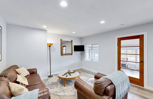 Post Falls Casa | Riverfront charmer with sunroom, gas grill, games, smart TVs, W/D, & partial AC