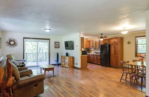 Covington Cabaña | Riverfront Covington Cabin w/ Deck & Fire Pit!