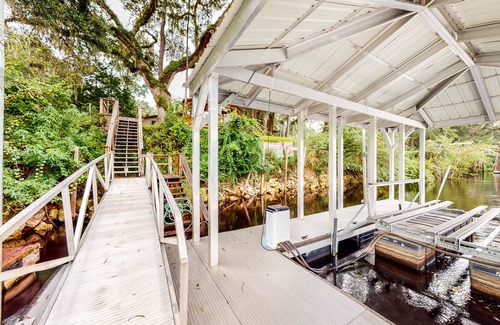 Bell Casa | Riverfront Home with Private Dock, Boat House & Boat Lift - Fireplace & W/D