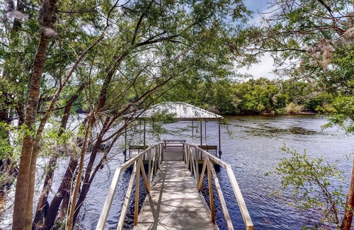 Bell Casa | Riverfront home with screened porch, shared dock