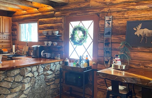 Wentworth Cabina | Riverfront Log Cabin with Mountain Views - Hot Tub & Wood Burning Fireplace