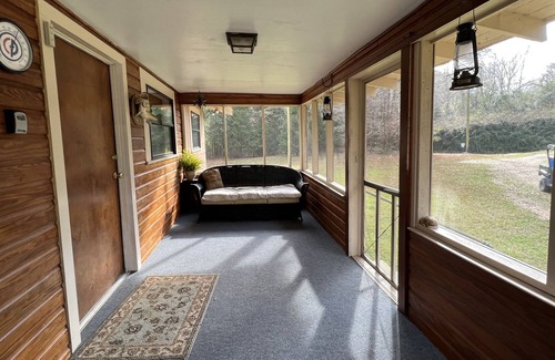 McComb Casa | “River’s Edge”, a secluded river- front, 2 bed 2 bath cottage in bamboo forest.