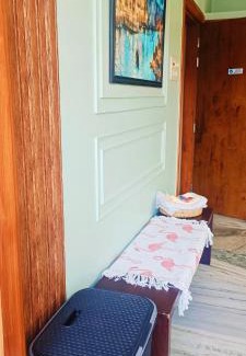 Sualkuchi Apartamento | Riverside Palm Luxe 2BHK with AC in both bedrooms near Kamakhya & IHR