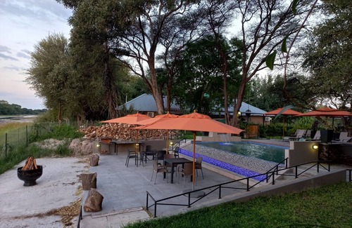 Maun Cabaña | Riverside Splash- Stylish and Cozy Cottages by the River bank