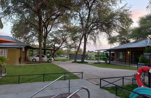 Maun Cabaña | Riverside Splash- Stylish and Cozy Cottages by the River bank