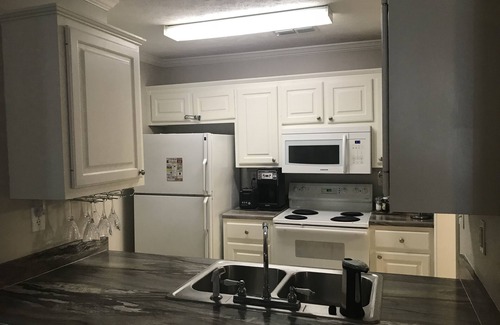 Starkville Condominio | Road Dawg Condo Bienvenido al país de Dios.