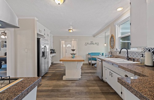 Downtown Riverside Casa | Roaring 20s Vintage Craftsman Home Downtown, Hot Tub, Pool Table