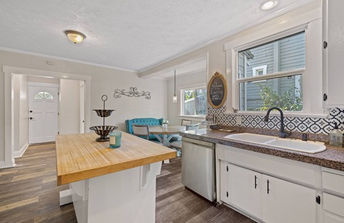 Downtown Riverside Casa | Roaring 20s Vintage Craftsman Home Downtown, Hot Tub, Pool Table