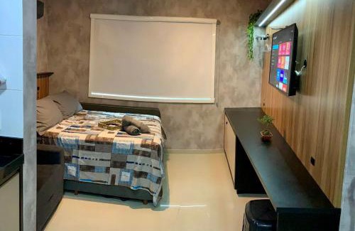 Pioneiros Apartamento | Roda Gigante, garagem e piscina