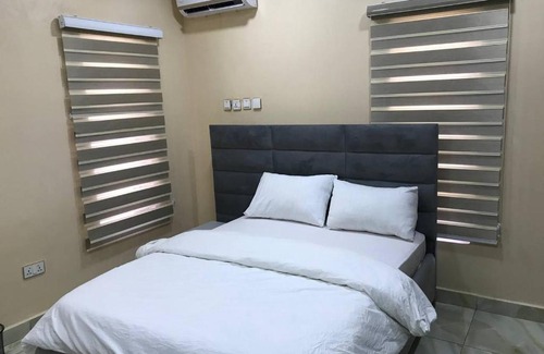 Abuja Apartamento | Roman Cabin