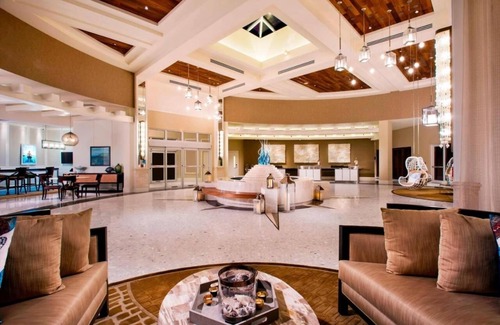 Rock Harbor Hotel | Romantic Beach Getaway! Gym, Pool & Spa Access! Pet Friendly King Stay!