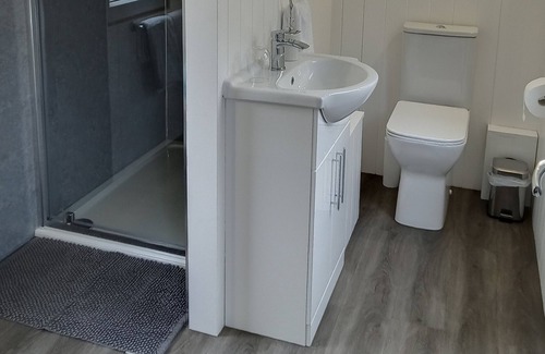 Caio Cabina | Romantic cosy railway carriage with hot tub and garden.