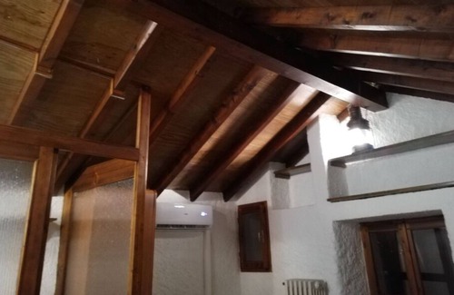 Belgirate Casa | Romántica cabaña rodeada de vegetación con vista al lago