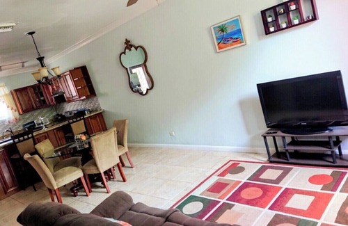Coral Harbour Casa | Romantic Getaways or Family fun. Enjoy Island Vibes at 2BR Townhome Near Beach!