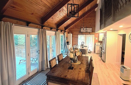 Dysart et al Chalet De Esquí | Romantic Retreat with King Suite, Luxurious Chalet Surrounded by Towering Maples