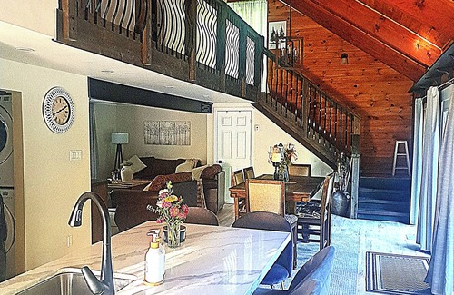 Dysart et al Chalet De Esquí | Romantic Retreat with King Suite, Luxurious Chalet Surrounded by Towering Maples