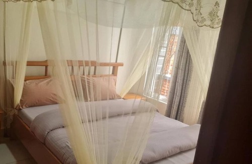 Western Province Casa | Room in Guest Room - Charming Room in Kayove, Rwanda - Your Perfect Getaway