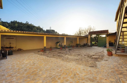 Coimbra Apartamento | Habitación 'Quarto 2 Rc - Quinta Df' con vistas a la montaña, Wi-Fi y aire acondicionado.