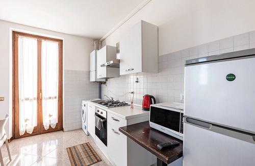 Pizzoletta Apartamento | Habitación 'Tripla Con Balcone' con terraza compartida, Wi-Fi y aire acondicionado.