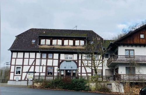 Schieder-Schwalenberg Casa | Room with king-size bed and balcony