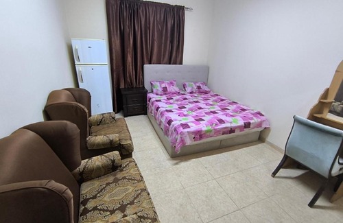Al Qasimia Casa | Rooms opposite mega mall in telephone shops roundabout flat no 203