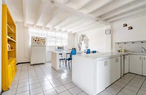 Pasochoa Apartamento | Rooms within what was a schooln
