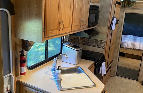 Combs Casa | Roomy 3 Bed RV- Near the White River, Fishing, Trails and Hunting