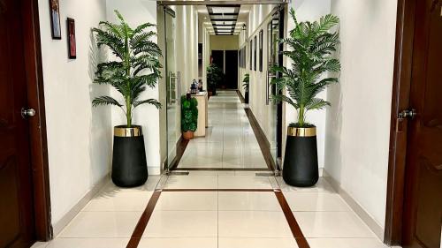 PECHS Hotel | Royal Inn Hotel