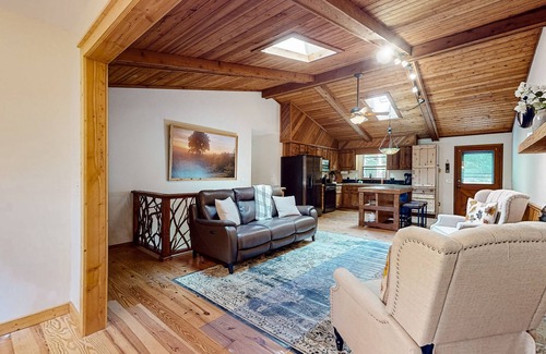 Blairsville Cabina | Rural cabin in wooded lot with firepit, fireplace, grill, wraparound deck, W/D