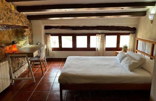 El Pinell de Brai Casa | Rural Stone House with wood fireplace