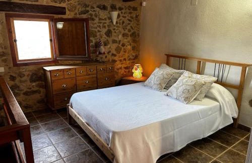 El Pinell de Brai Casa | Rural Stone House with wood fireplace