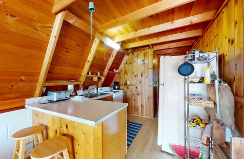Williamsburg Casa | Rustic A-Frame Retreat on Grand Traverse Bay w/ beach, wifi, fire pit & grill