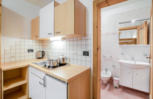 Colfosco Apartamento | Rustic Apartment near Ski Areas with Wi-Fi, Garden and Terrace