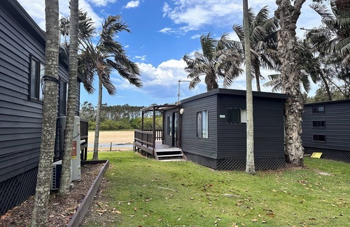 Arrawarra Headland Cabina | Rustic Driftwood Beachfront Cabins