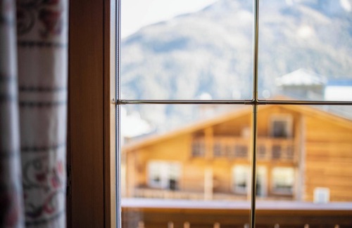 Vigo di Fassa Apartamento | Apartamento vacacional rústico "Villa Mazzel" con Wi-Fi, balcón y vistas a la montaña
