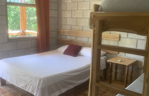 Marbella Cabina | Rustic jungle lodge in a tranquil garden setting - Room 5 Family room