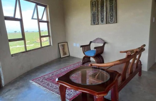 Lusikisiki Cabaña | Rustic Retreat In A Peaceful Village. Overlooking The River And Ocean.