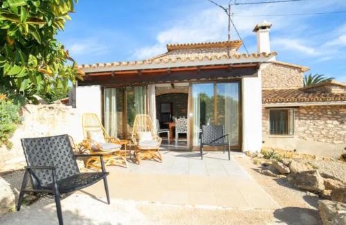 Fustera Casa | Rustico Appartment 'Olta' in finca, see-and garden side
