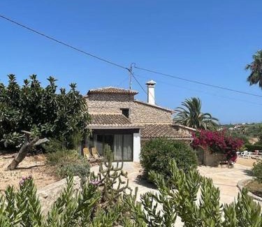 Fustera Casa | Rustico Appartment 'Olta' in finca, see-and garden side