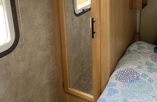 Aztec Casa | RV hookup next to our family friendly home. Between Aztec, NM and Durango, CO