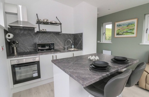 Borth Cabaña | RYDLAN, family friendly, with hot tub in Borth