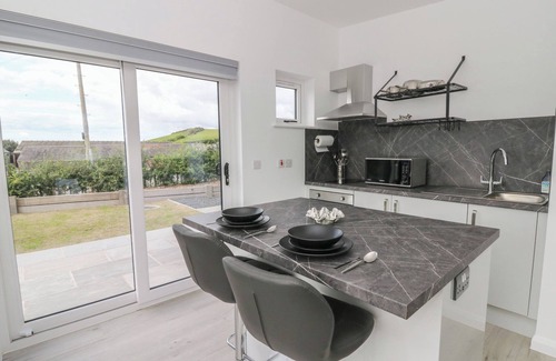 Borth Cabaña | RYDLAN, family friendly, with hot tub in Borth