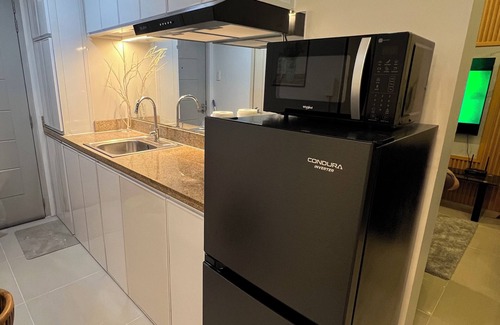 Santo Cristo Complejo | Ryle and Yang's Stylish 2BR Stay