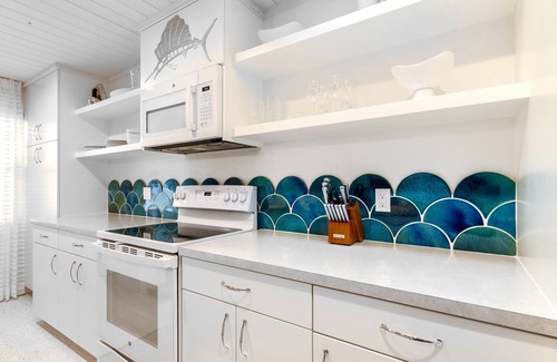 Whitney Beach Cabaña | Sailfish Gulf Suites #4, Garden Views, Steps from the Beach