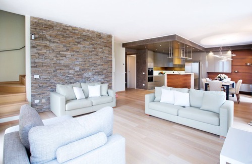 Sala Comacina Apartamento | Suite de vanguardia para el hogar con vista panorámica al lago de 180 °, piscina, sauna y jacuzzi