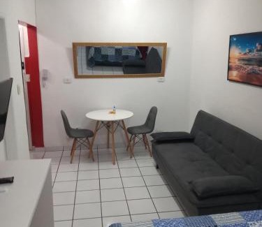 Ponta da Praia Apartamento | Sala living na Av da Praia.