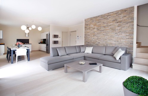 Sala Comacina Apartamento | Residencia de lujo con vista al lago para 10 personas con piscina cubierta, jacuzzi y sauna.