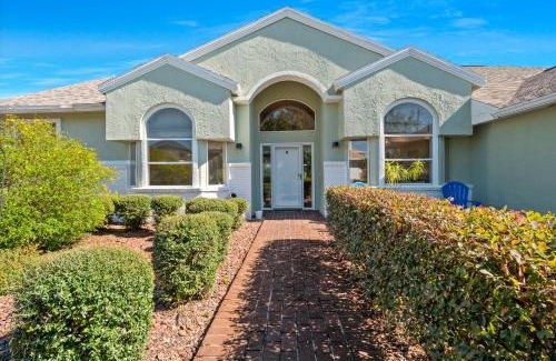 Palm Harbor Casa | SALTY TURTLE Luxury Salt Water Pool Home on Salt Water Canal with Tiki Bar