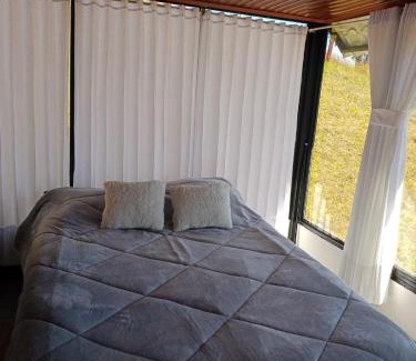 Tota Casa | SAN ALEJO- CABAÑAS Y CAMPING